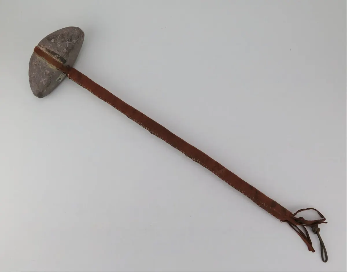 Native American Plains Indian stone head war club. PROVENANCE