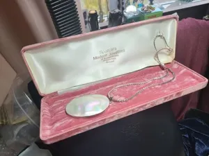 ANTIQUE STERLING SILVER LARGE MOTHER OF PEARL PENDANT AND 18" SILVER CHAIN