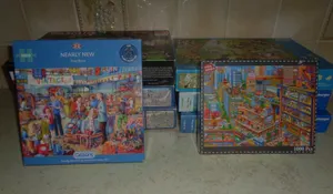 Job Lot jigsaw puzzles mostly worn boxes unchecked all different scenes / makes